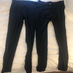 Two pairs of black full-length Athleta leggings size Medium